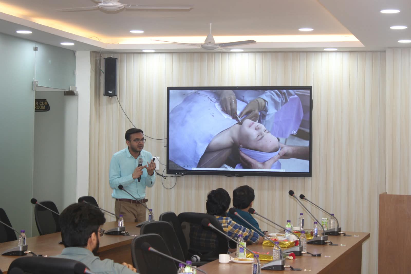 Speaker discussing an image-guided interventional procedure